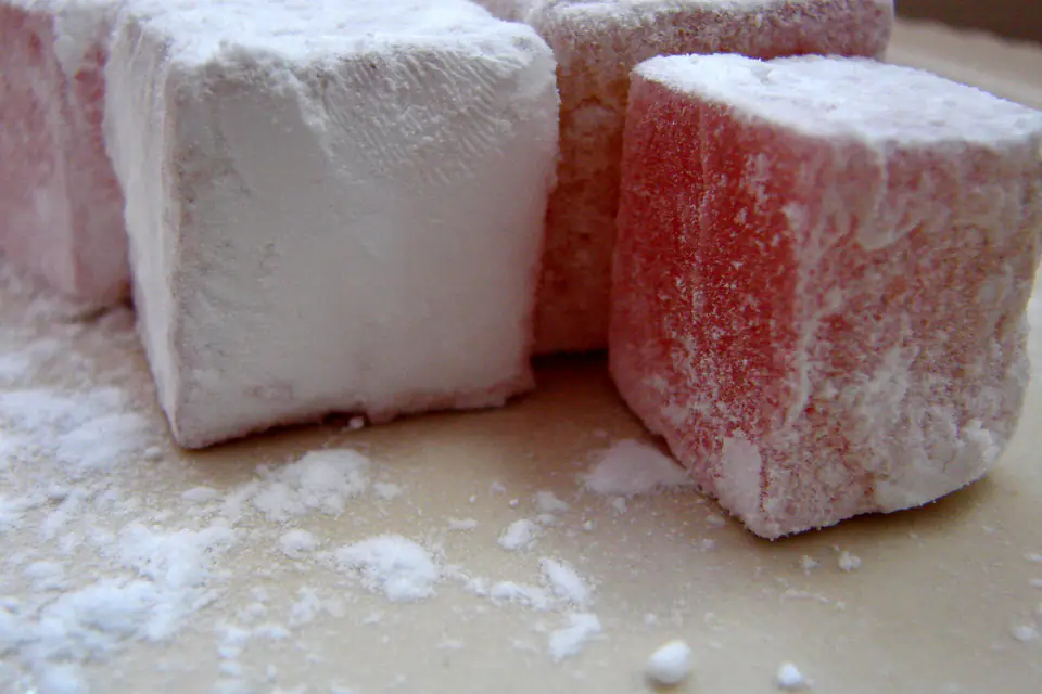Pink and white Turkish delight dusted with powdered sugar