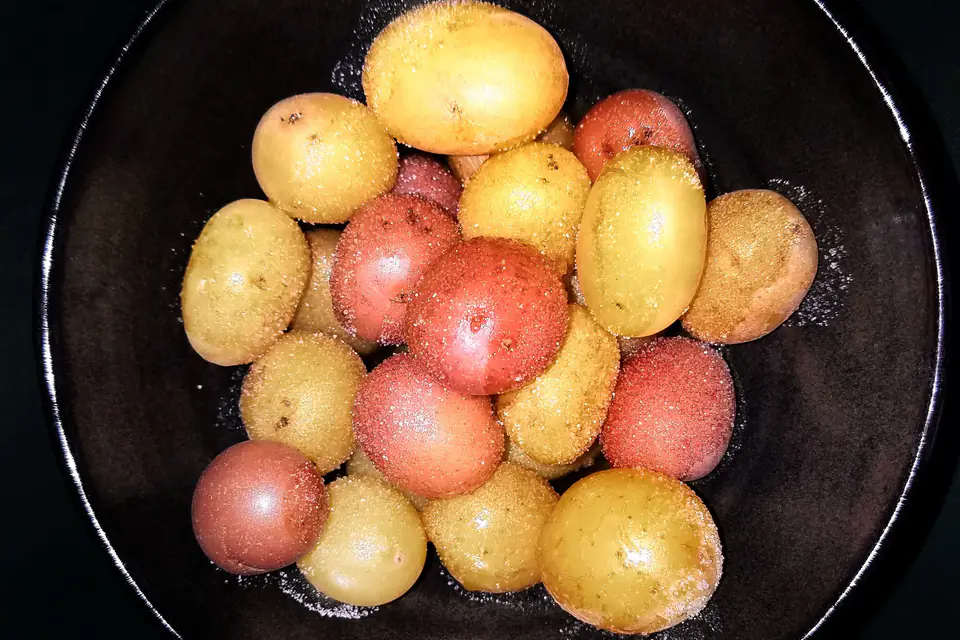 Small boiled potatoes in a pan