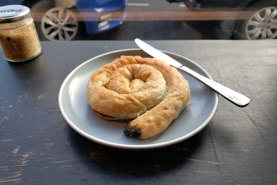 A spiral börek on a plate