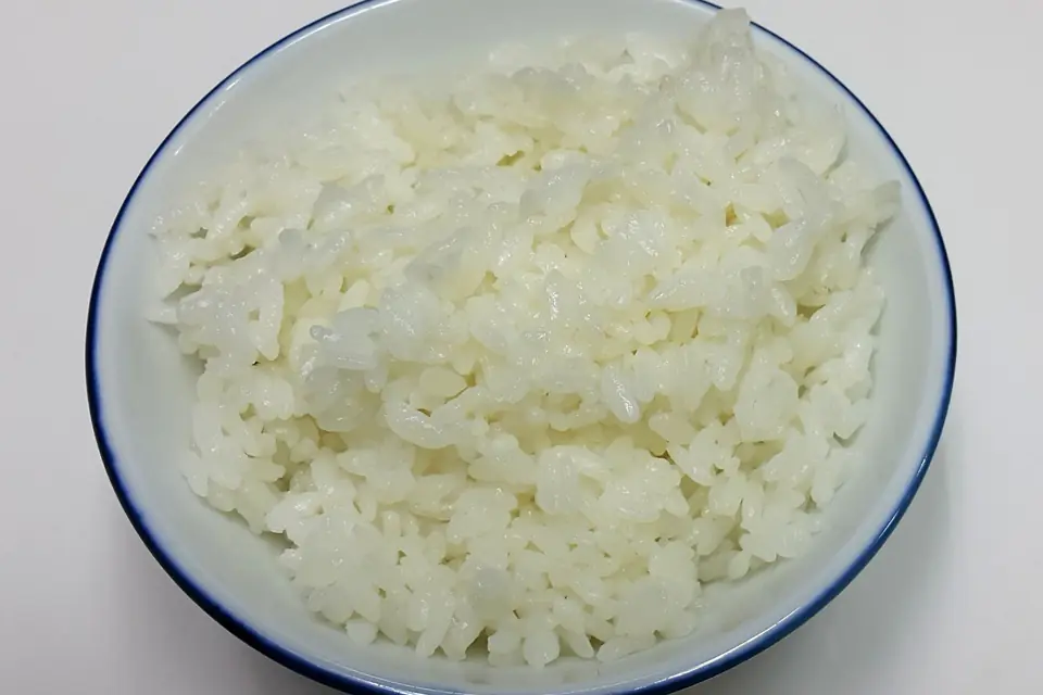 Boiled white rice in a white bowl