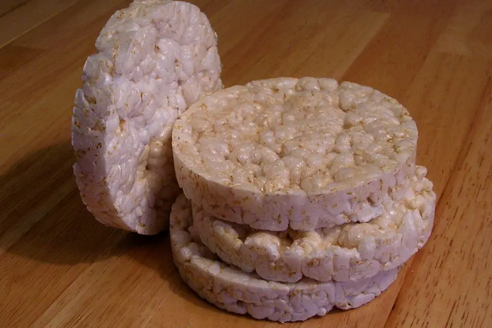 Rice cakes stacked on a wooden table