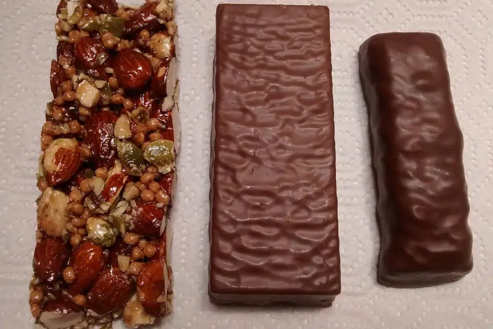 Three protein bars on a paper towel